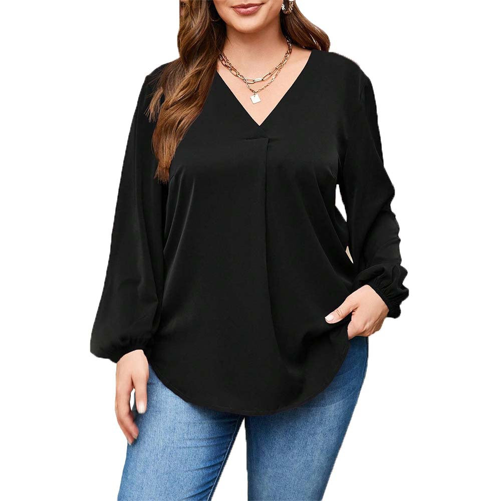 Dame afslappet bluse med stilfulde voluminøse ærmer og elegant V-hals Stilla