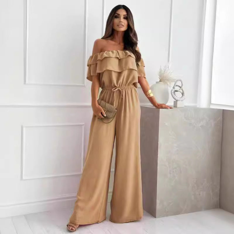Dame jumpsuit med skulderfri design og bredt ben Stilla