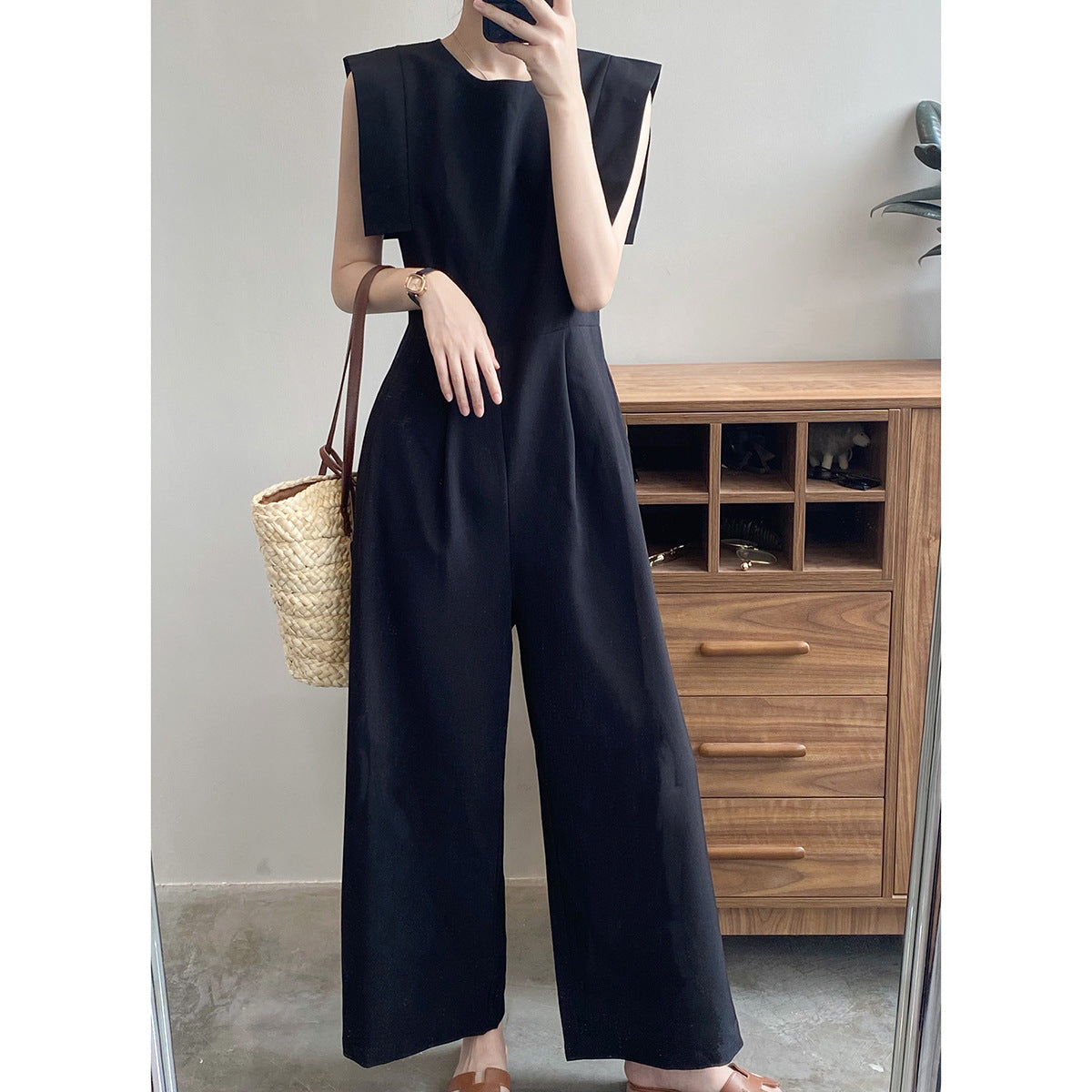 Dame jumpsuit med strukturerede skuldre og sidelommer Stilla