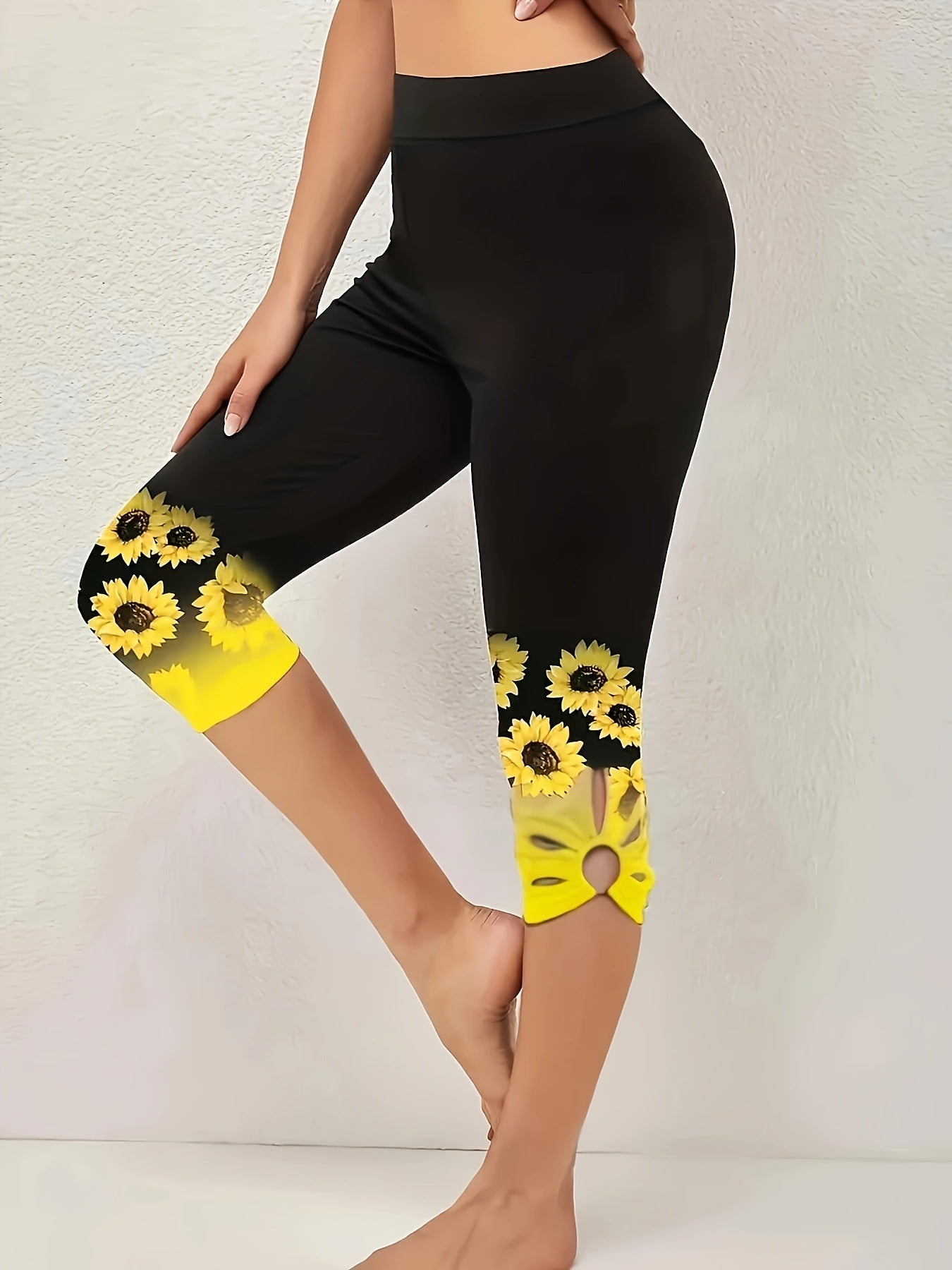 Dame Capri-Leggings med unikt solsikke-design og høj talje Stilla