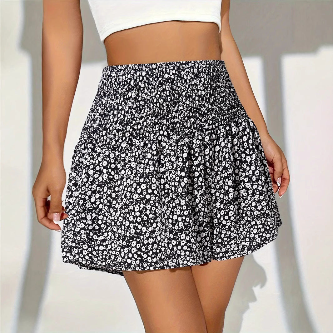 Dame shorts med elastisk talje og blomstret design Stilla