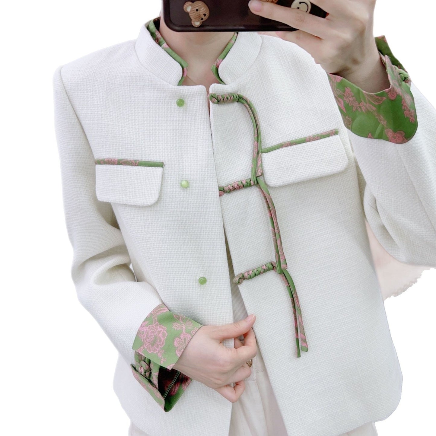 Dame designerjakke med elegant ståkrave og florale accenter Stilla