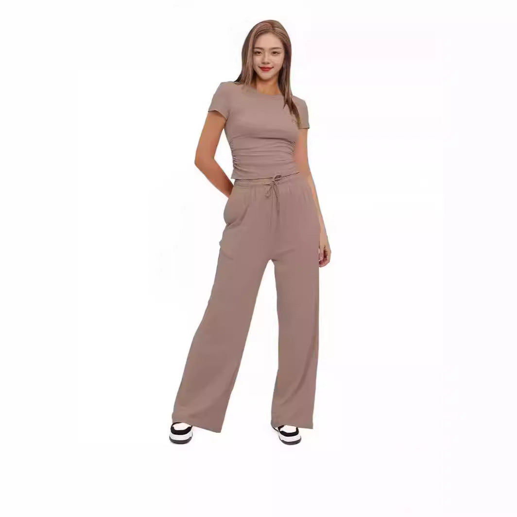 Dame fritids-jumpsuit med taljerbart design og afslappet snit Stilla