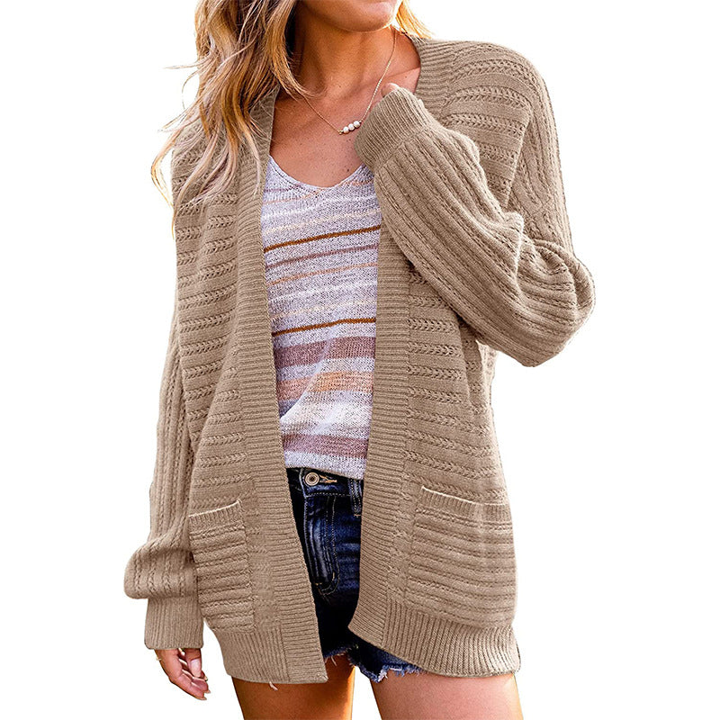 Dame strik cardigan med struktureret design og praktiske lommer Stilla
