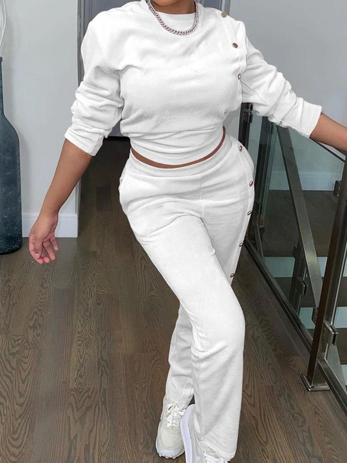 Dame Sporty fritidsoutfit med knapbart overdel og elastiske bukser Stilla