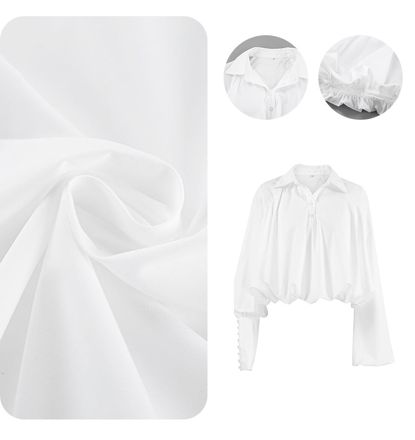 Dame cropped bluse med voluminøse ærmer og elegant høj krave Stilla