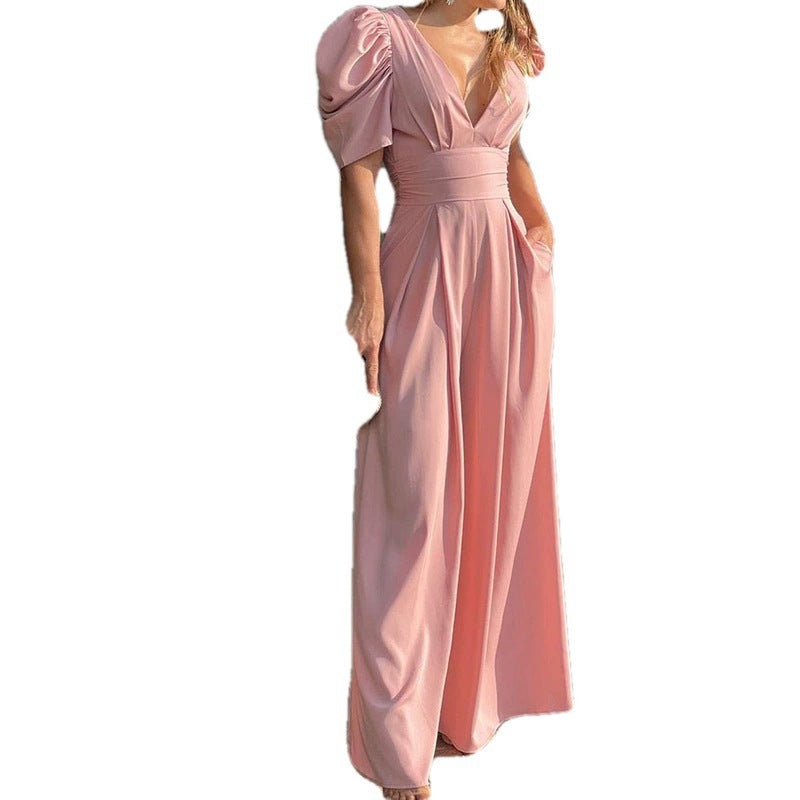 Dame jumpsuit med voluminøse ærmer og dyb v-hals Stilla
