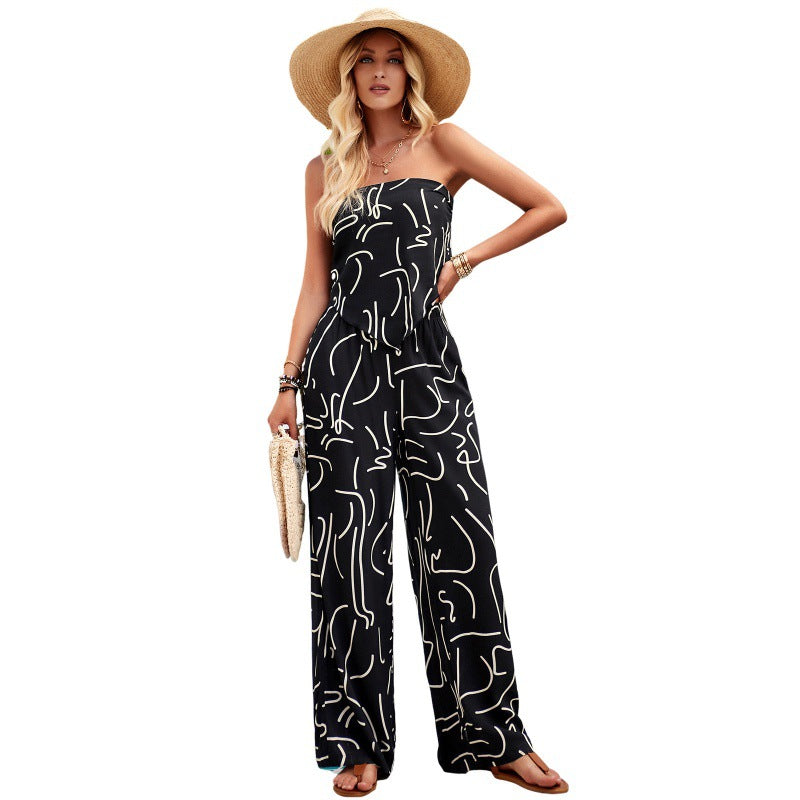 Dame luftig jumpsuit med grafisk design og bredt ben Stilla