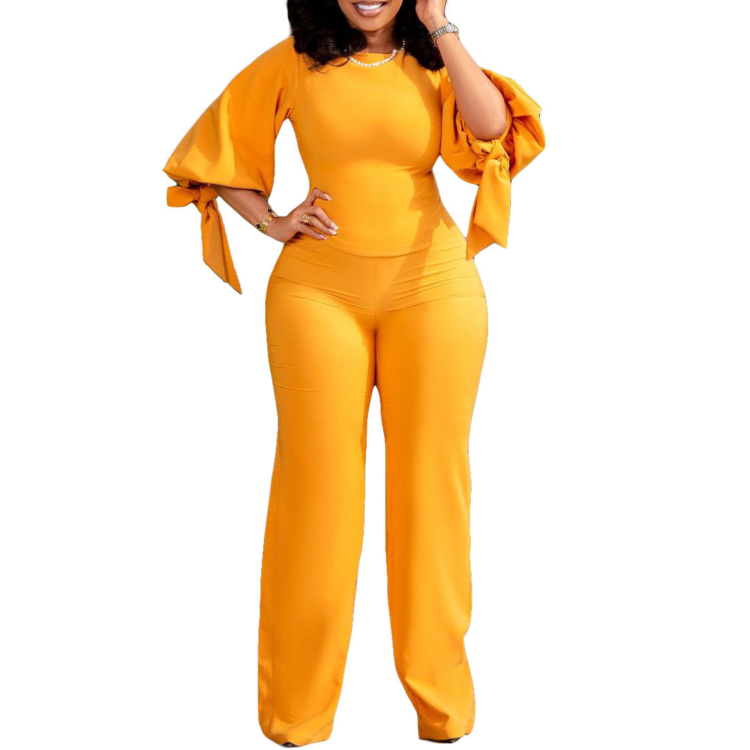 Dame Jumpsuit med dekorative ballonærmer og fleksibelt taljebælte Stilla