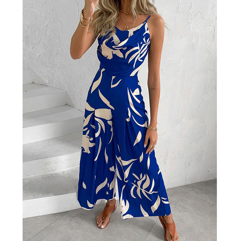 Dame jumpsuit med flydende snit og dekorative blomster motiver Stilla