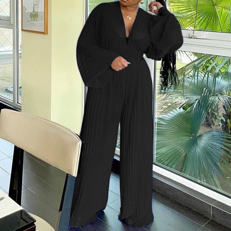Dame Plisseret Jumpsuit med højtstående udskæring og ballonærmer Stilla