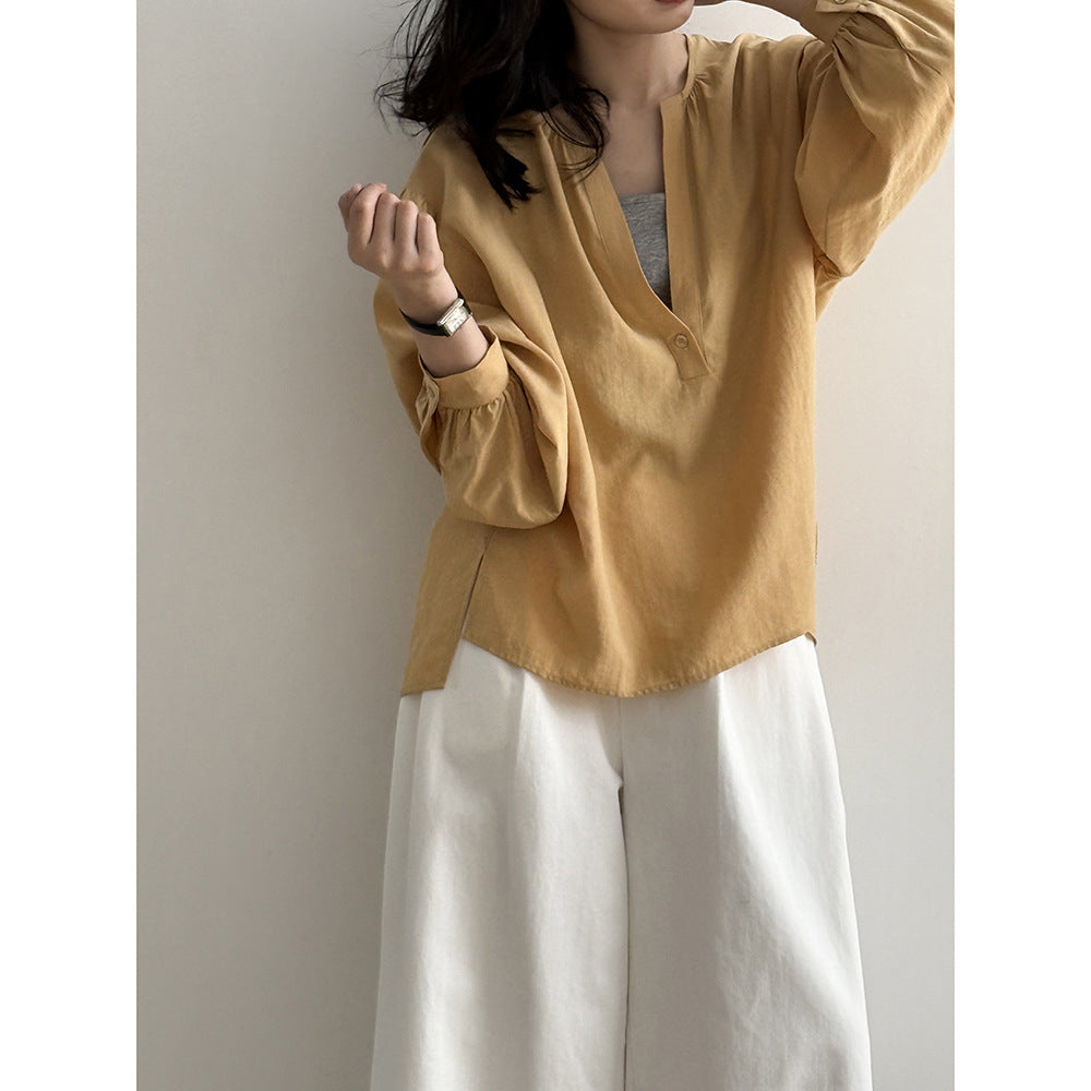 Dame afslappet bluse med ståkrave og elegant knappemulighed Stilla