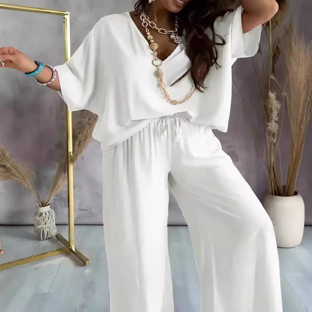 Dame jumpsuit med vidde snit og elegant V-udskæring Stilla