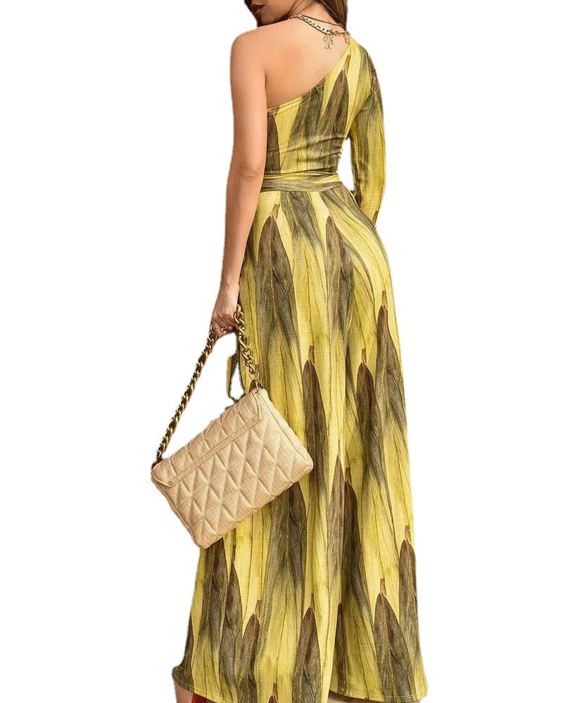 Dame jumpsuit med asymmetrisk design og botanisk mønster Stilla