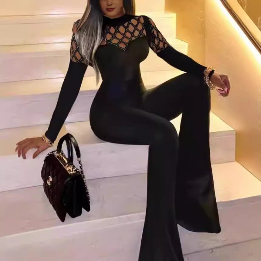 Dame jumpsuit med netlignende udskæringsdesign og elegante dekordetaljer Stilla