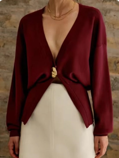Dame elegant strikcardigan med asymmetrisk snit og dekorativ knap Stilla