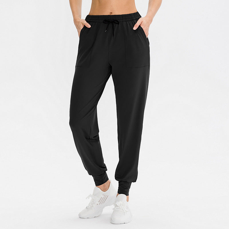 Dame Sporty Joggingbukser med praktiske lynlåslommer og fleksibel talje Stilla