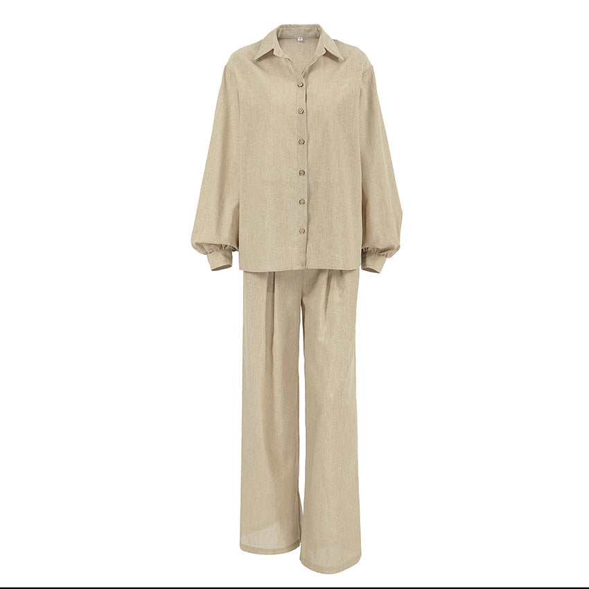 Dame elegant erhvervssæt med figursyet bluse og løst skåret bukser Stilla