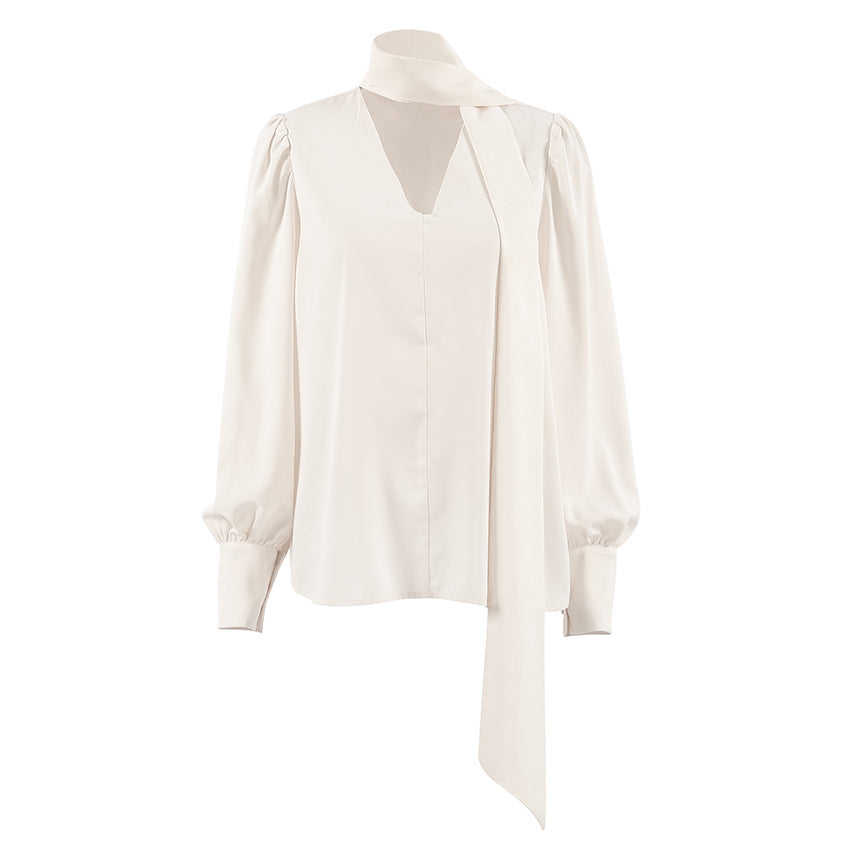 Dame elegant bluse med asymmetrisk binde detalje og voluminøse ærmer Stilla