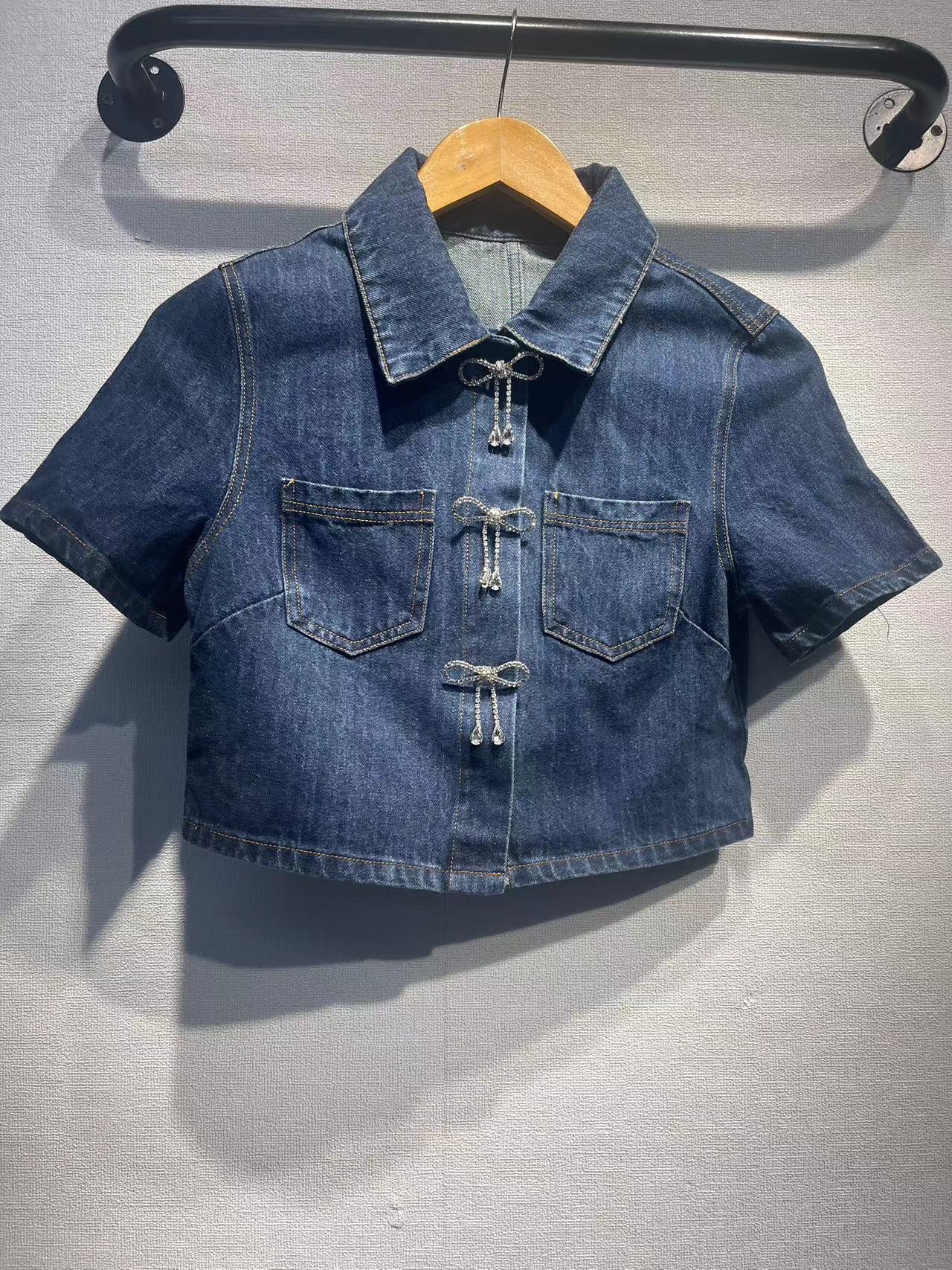 Dame Denim Mini Skirt med dekorative lommer og knaplukning Stilla