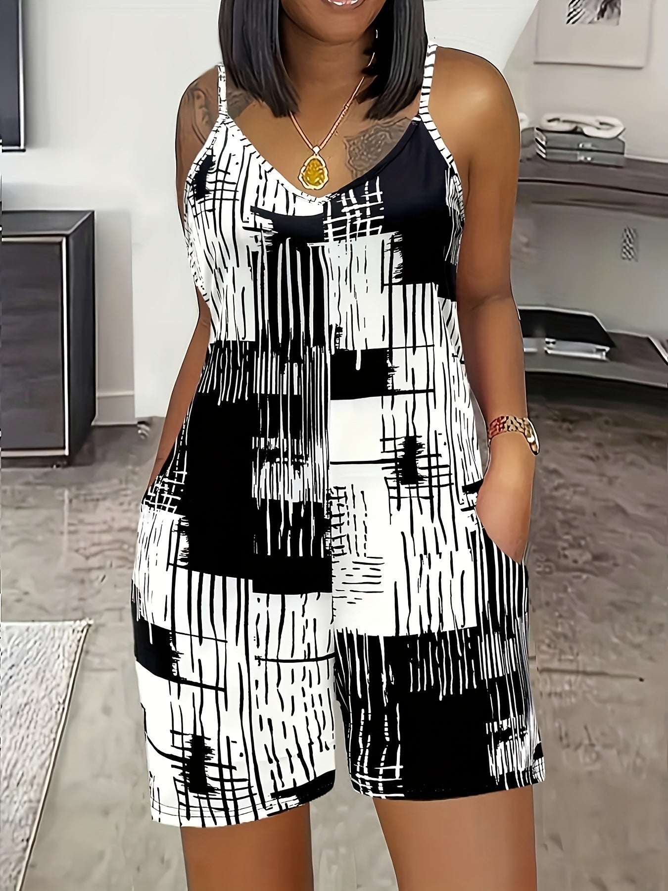 Dame moderigtig jumpsuit med grafisk design Stilla