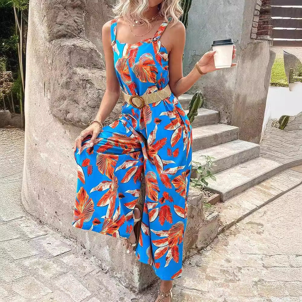Dame jumpsuit med floral design og tætsiddende bælte Stilla