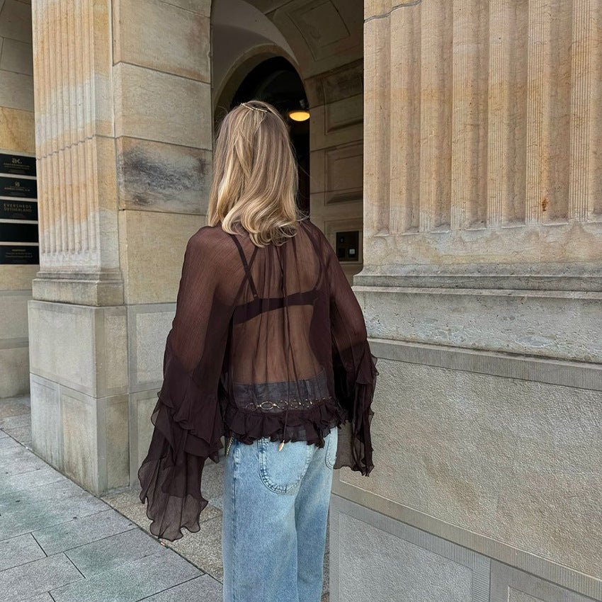 Dame Transparent Bluse med voluminøse flæsedetaljer og stilfuldt design Stilla