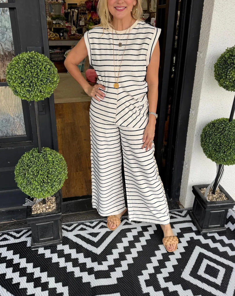 Dame stribet jumpsuit med bred ben og ærmeløst design Stilla