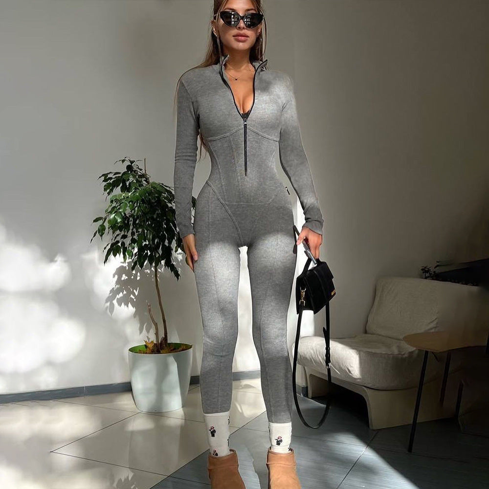 Dame figurtilpasset jumpsuit med høj krave og gennemgående lynlås Stilla