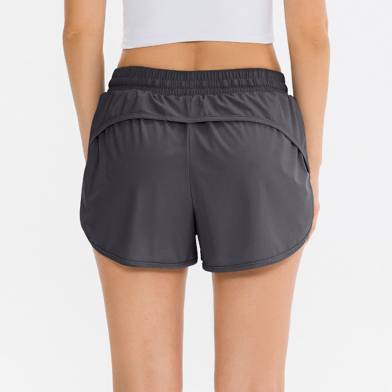 Dame Sporty Løbe Shorts med høj talje og praktiske sidelommer Stilla