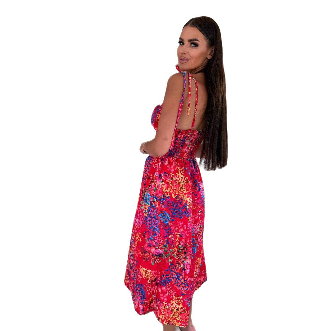 Dame jumpsuit med floral design og justerbare stropper Stilla