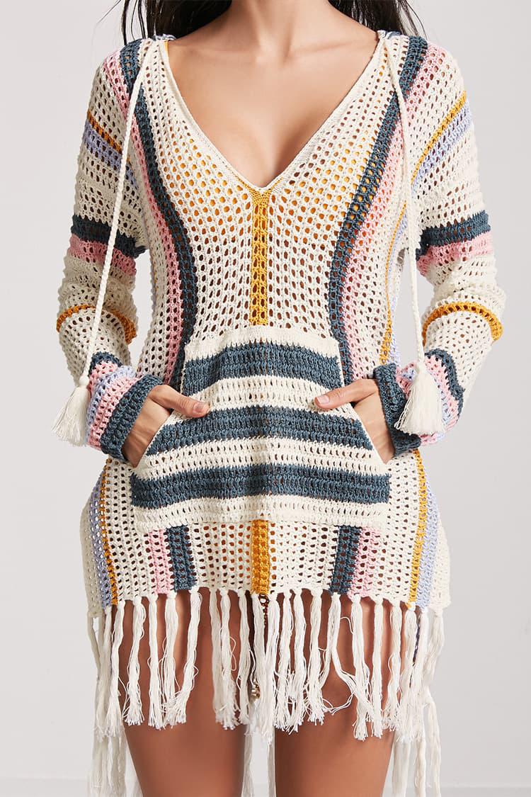 Dame afslappet strandpullover med moderne hulstrikdesign og frynser Stilla