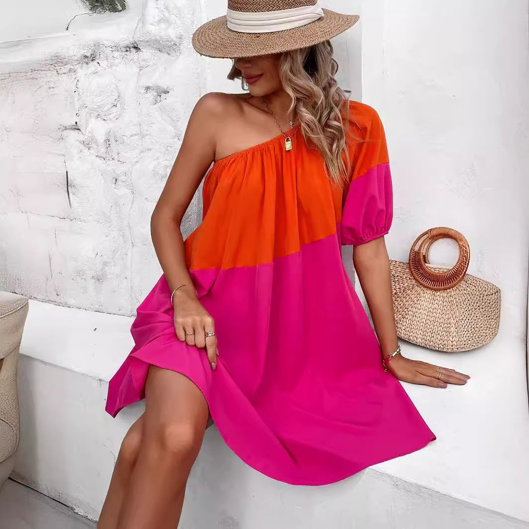 Dame afslappet asymmetrisk sommerkjole med en-sidig stropp og farverigt blokdesign Stilla