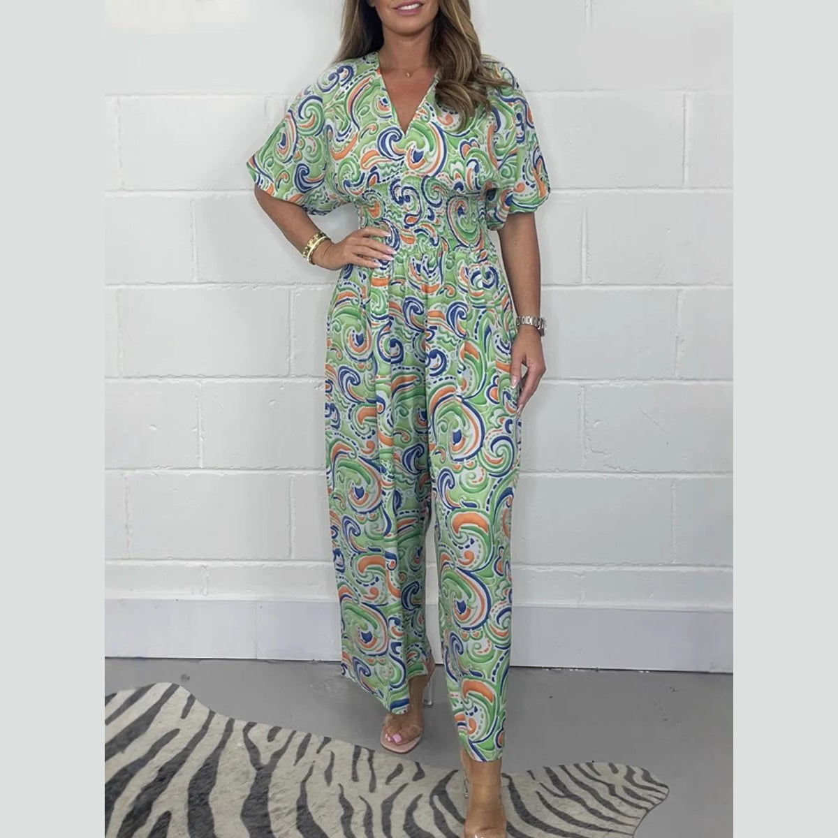 Dame Elegant Jumpsuit med brede ben og dyb V-hals Stilla