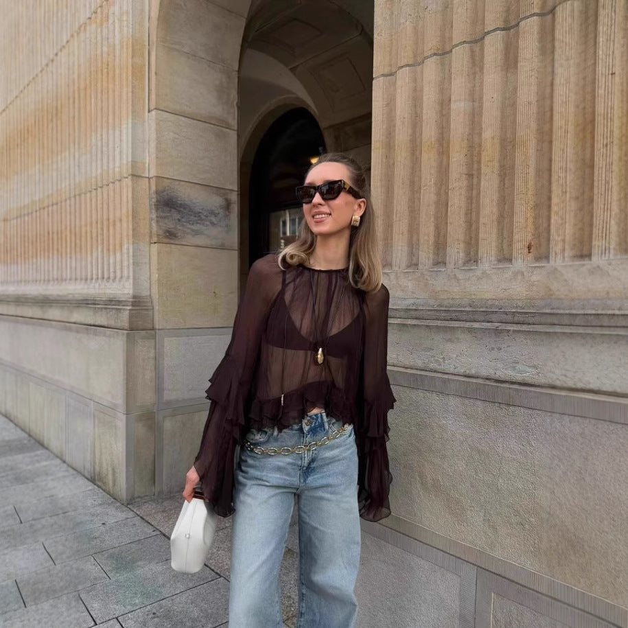 Dame Transparent Bluse med voluminøse flæsedetaljer og stilfuldt design Stilla
