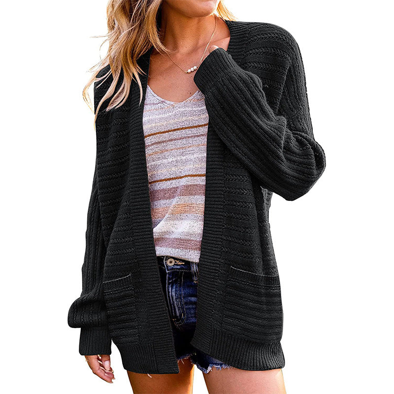 Dame strik cardigan med struktureret design og praktiske lommer Stilla