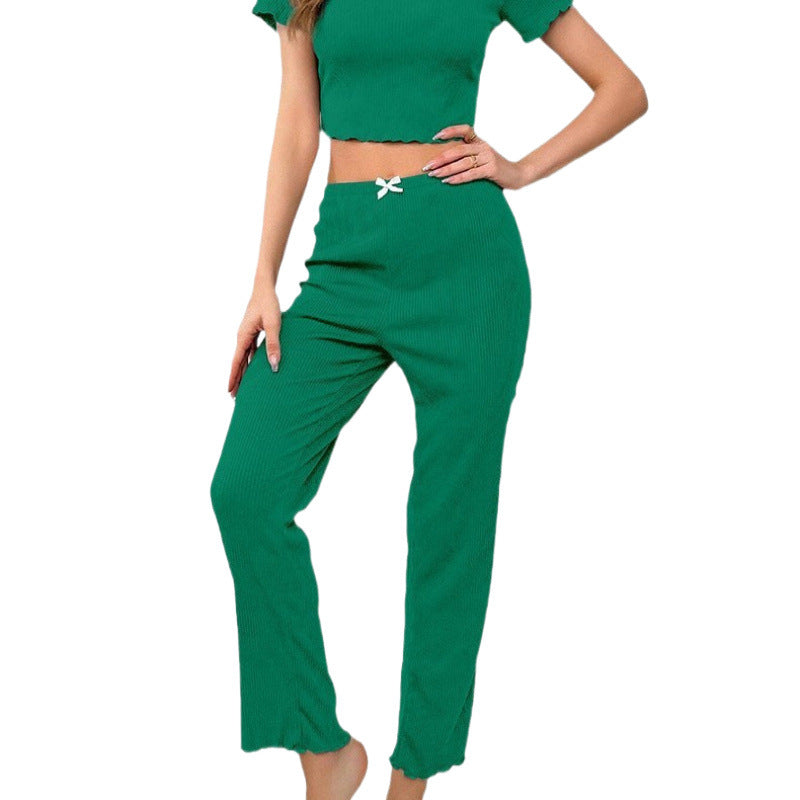 Dame fritids-jumpsuit med moderne ribdesign og legende sløjfedetalje Stilla