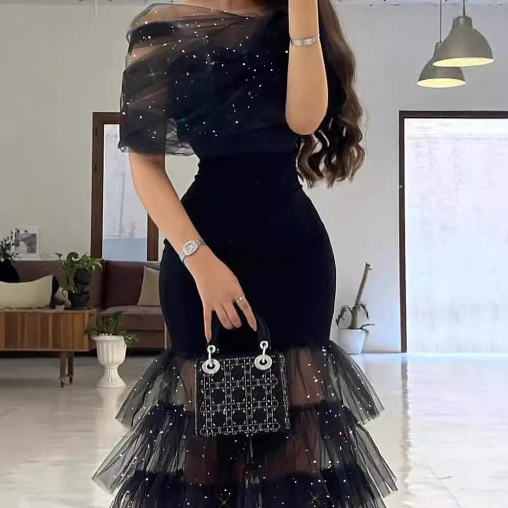 Dame Couture kjole med glitrende tyl lag og elegante ærmer Stilla
