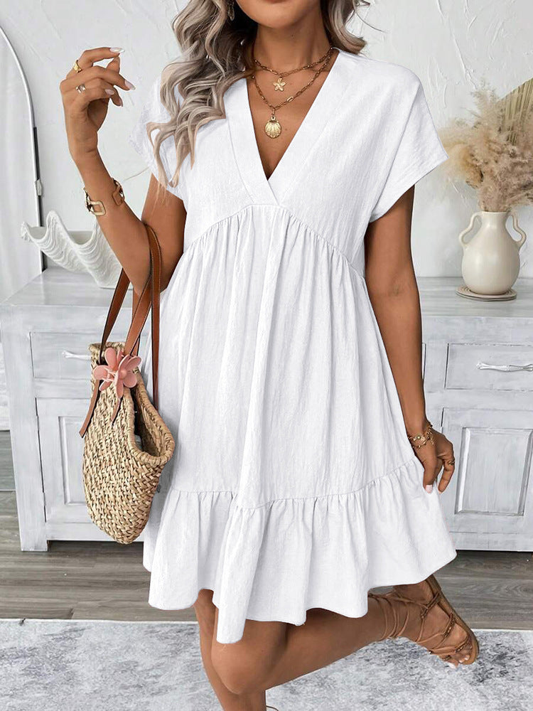 Dame afslappet sommerkjole med V-udskæring og voluminøs bund Stilla