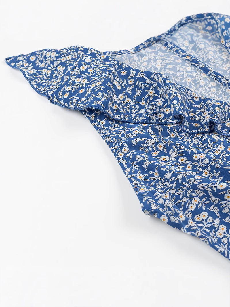 Dame jumpsuit med legende flæse-design og blomstermønster Stilla