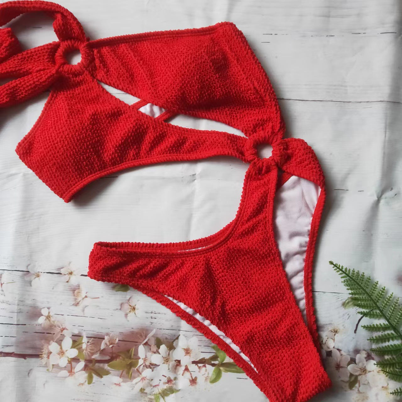 Damebikinier med unikt indpakningsdesign og fashionable ringdetaljer Stilla
