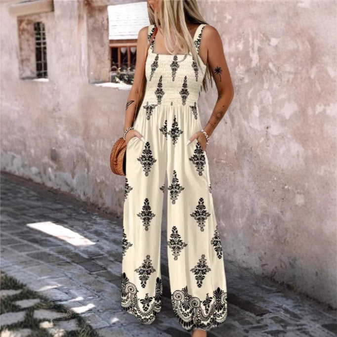 Dame luftig jumpsuit med blomstermønster og praktiske lommer Stilla