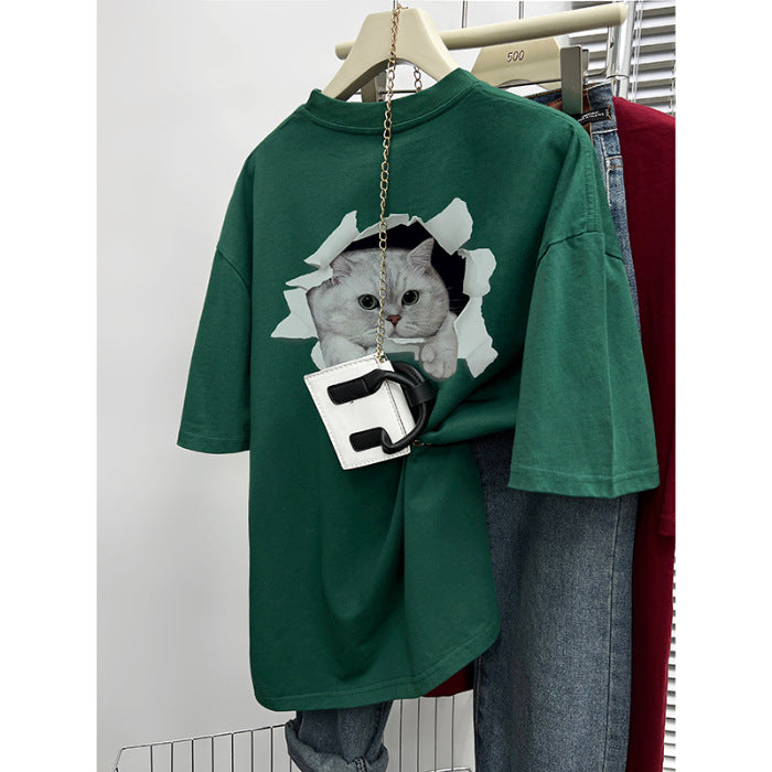 Dame T-shirt med kreativt kattemotiv gennem gennemboret væg Stilla