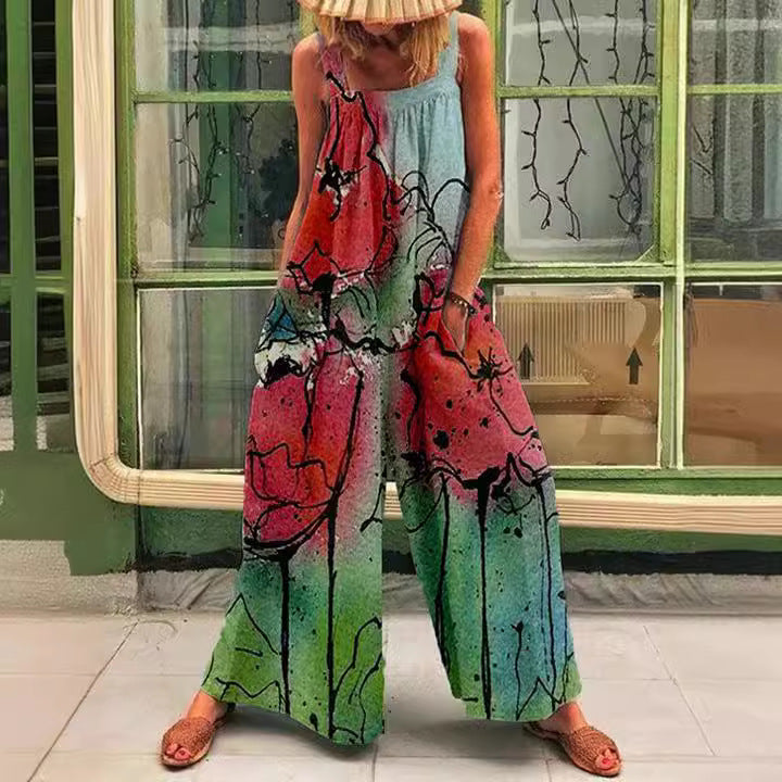 Kvinde luftig Jumpsuit med farverigt blomsterprint og praktiske sidelommer Stilla