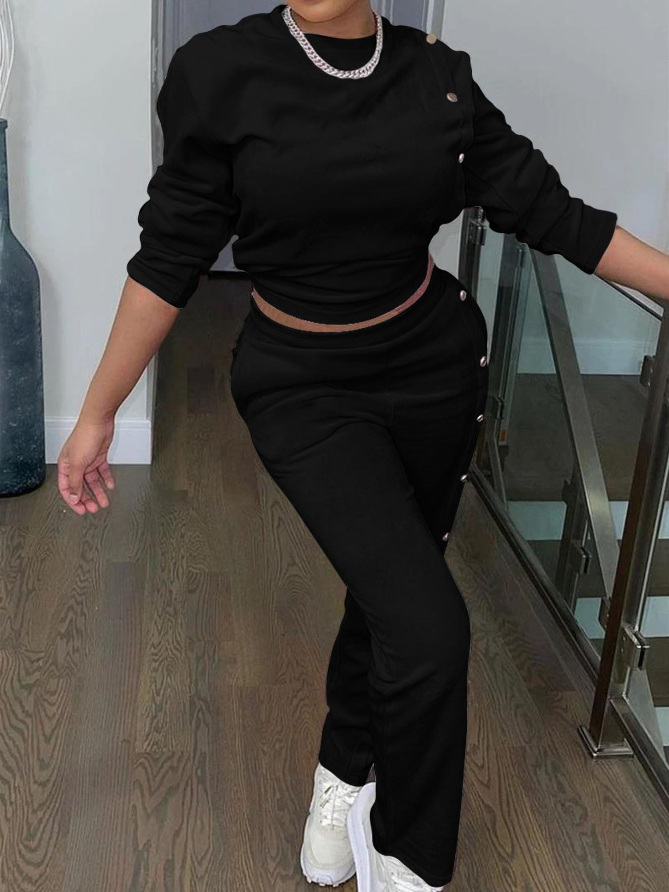 Dame Sporty fritidsoutfit med knapbart overdel og elastiske bukser Stilla