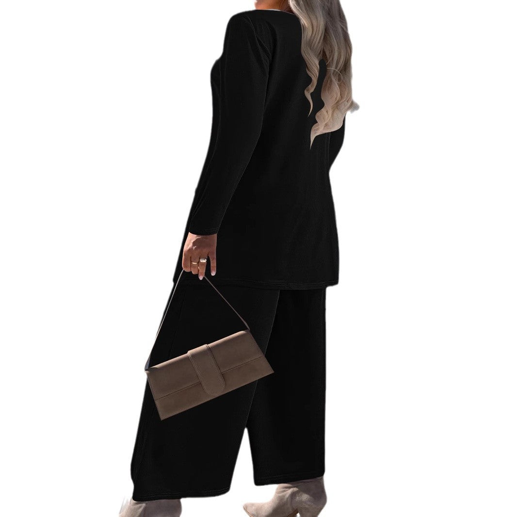 Dame Elegante og komfortabel todelt outfit med brede bukser og flydende top Stilla