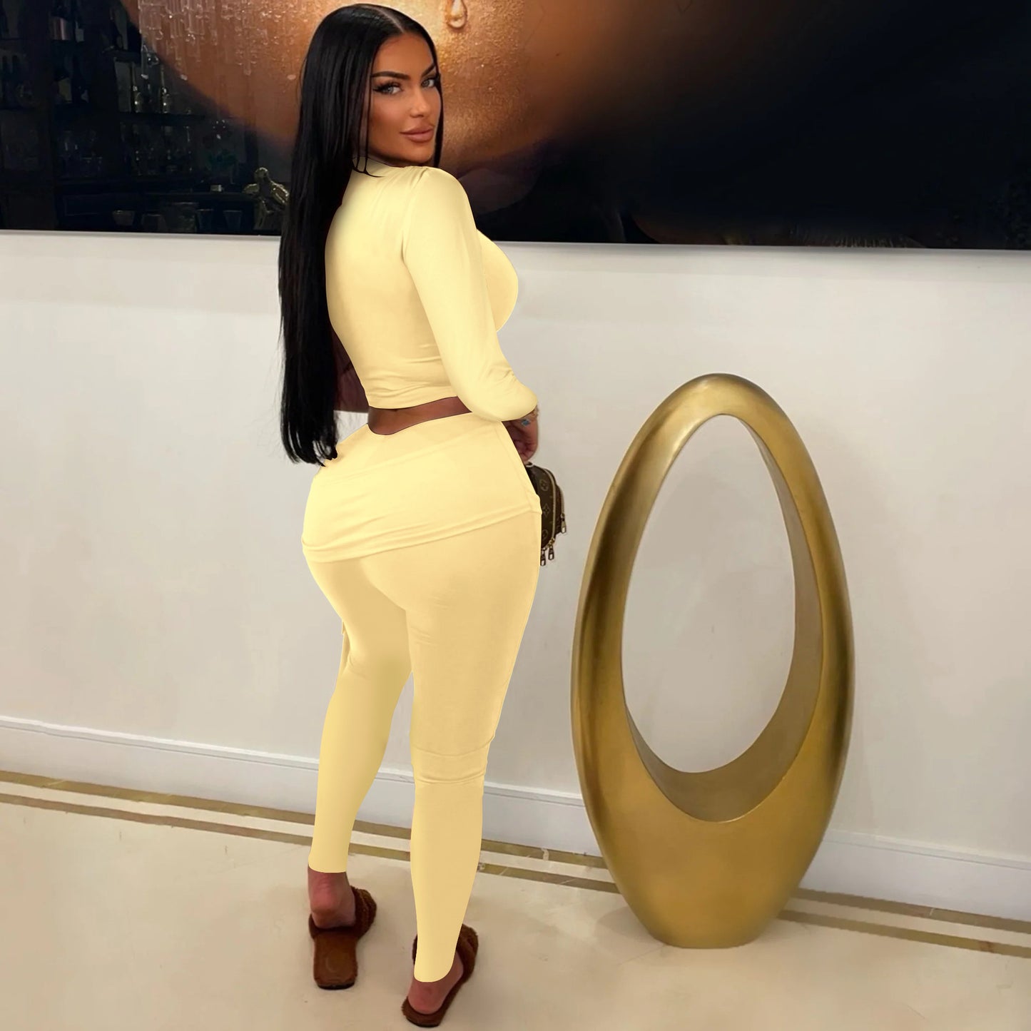 Dame sportsligt lounge-sæt med asymmetrisk top og tætsiddende leggings Stilla