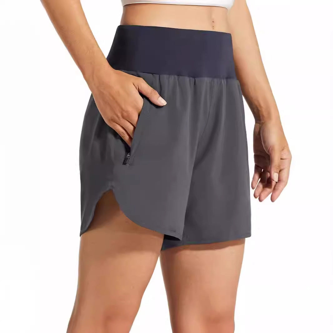 Dame Sporty Løbe shorts med sidelommer med lynlås Stilla