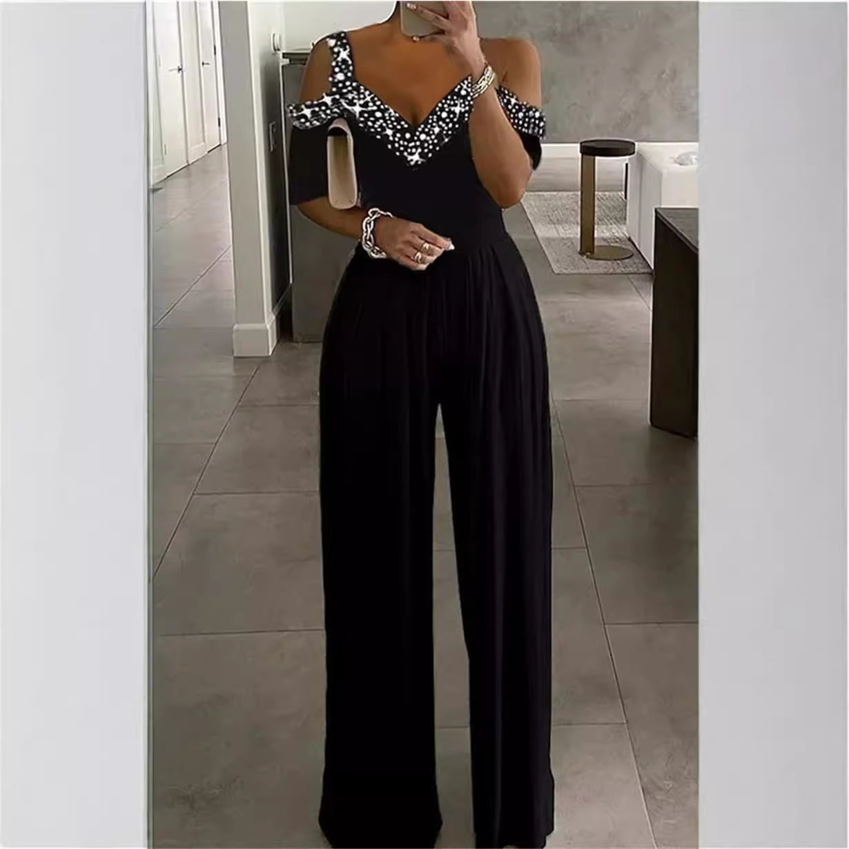 Dame elegant jumpsuit med Off-Shoulder design og sammensnørret talje Stilla