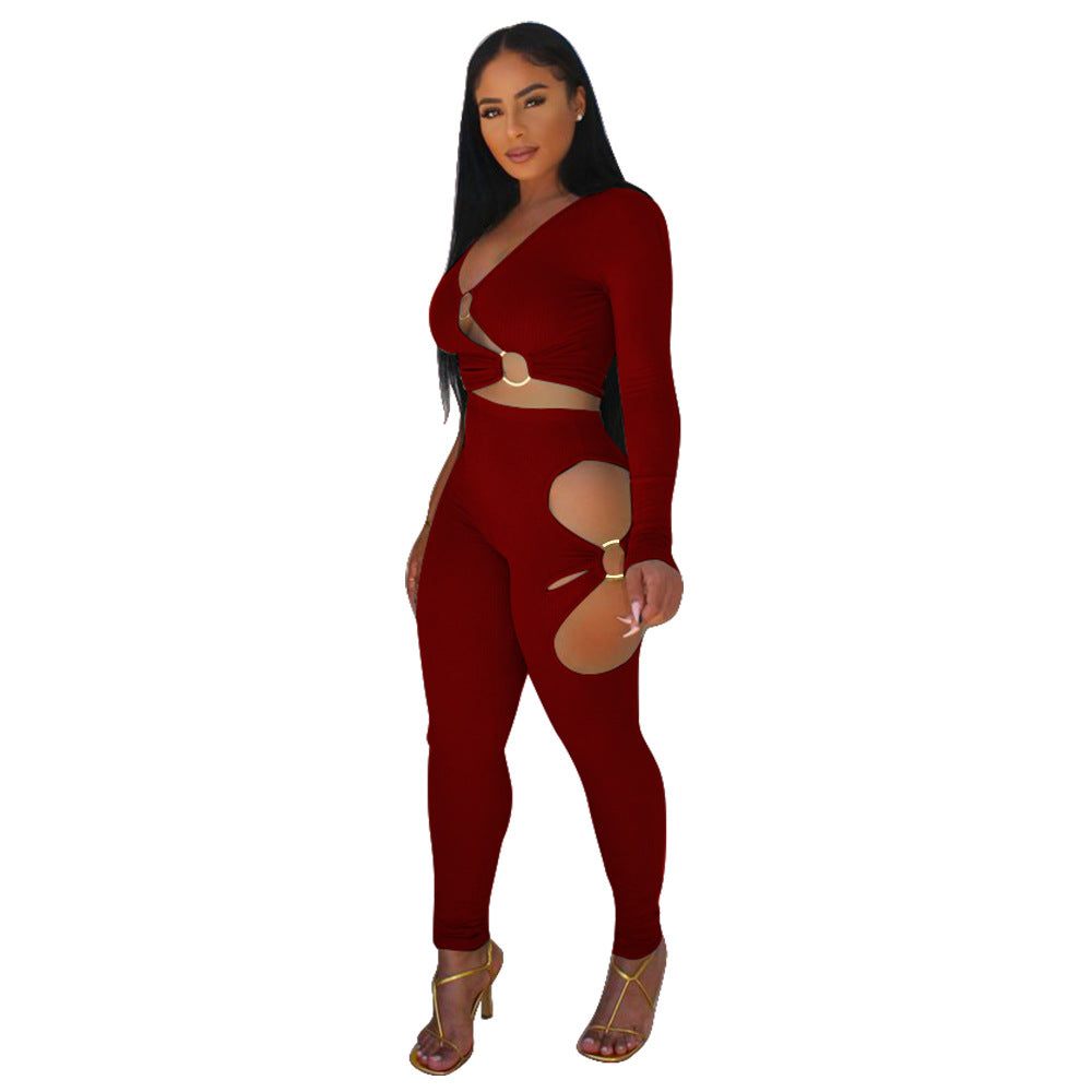 Dame Cut-Out Jumpsuit med glitrende design og lange ærmer Stilla
